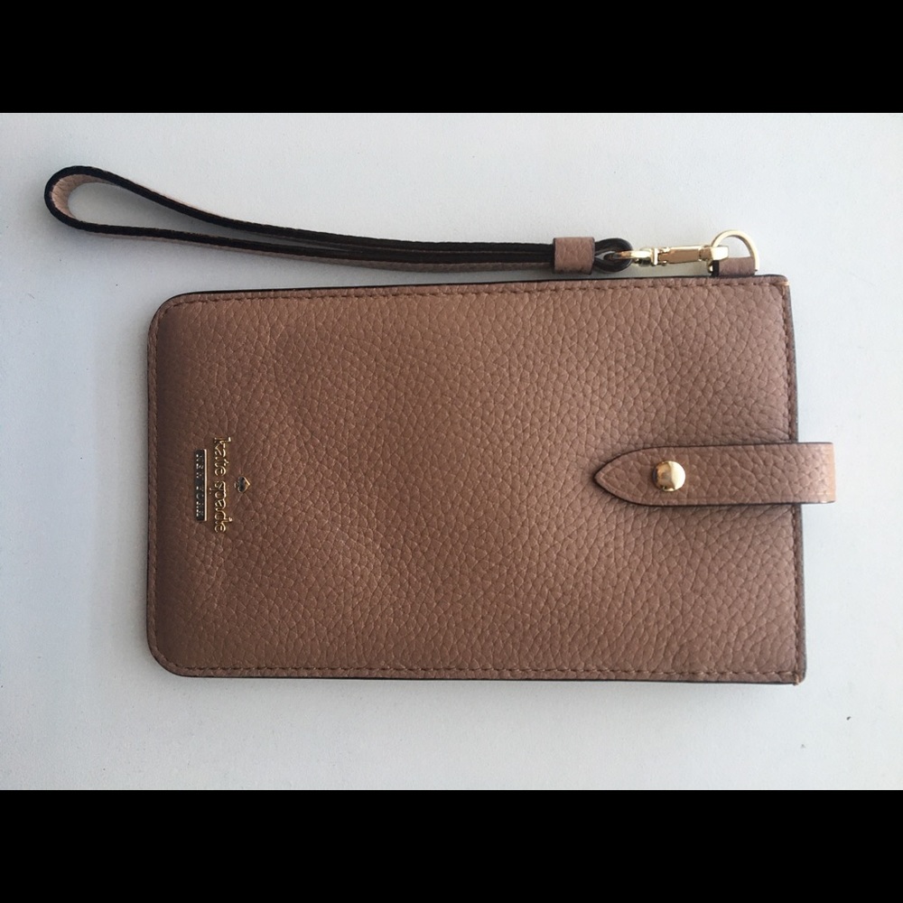 Nude Kate Spade wrist-wallet. Never used